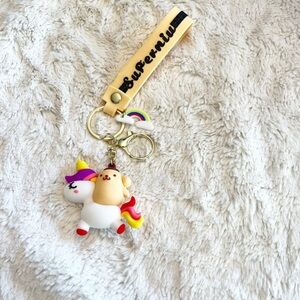 Sanrio Poppompurin on a Unicorn Keychain Wristlet Bag Charm